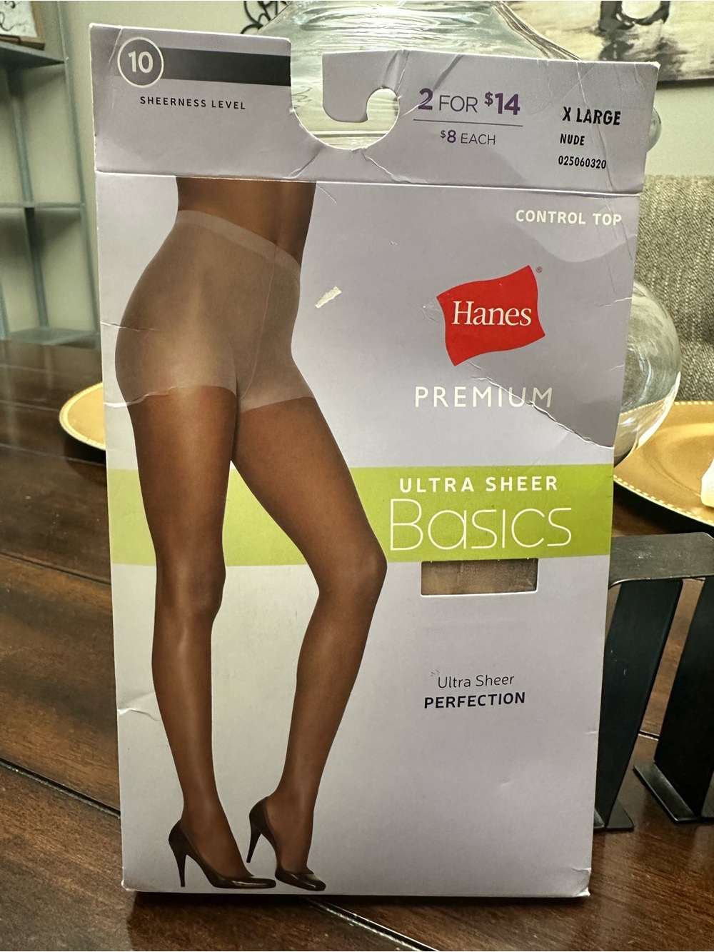 Women's hosiery packaging — image shows sheer pantyhose with heels